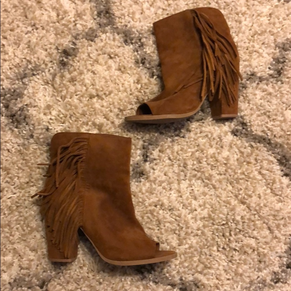 Tab heeled booties.
